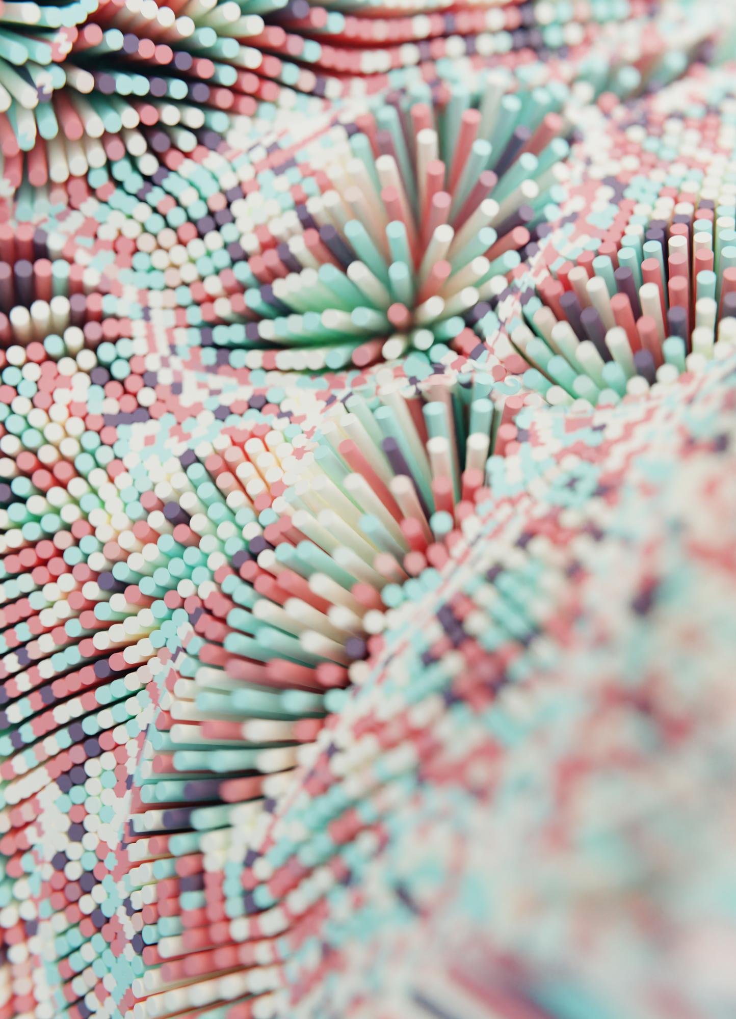 close-up of satin stitch motif in coral and teal